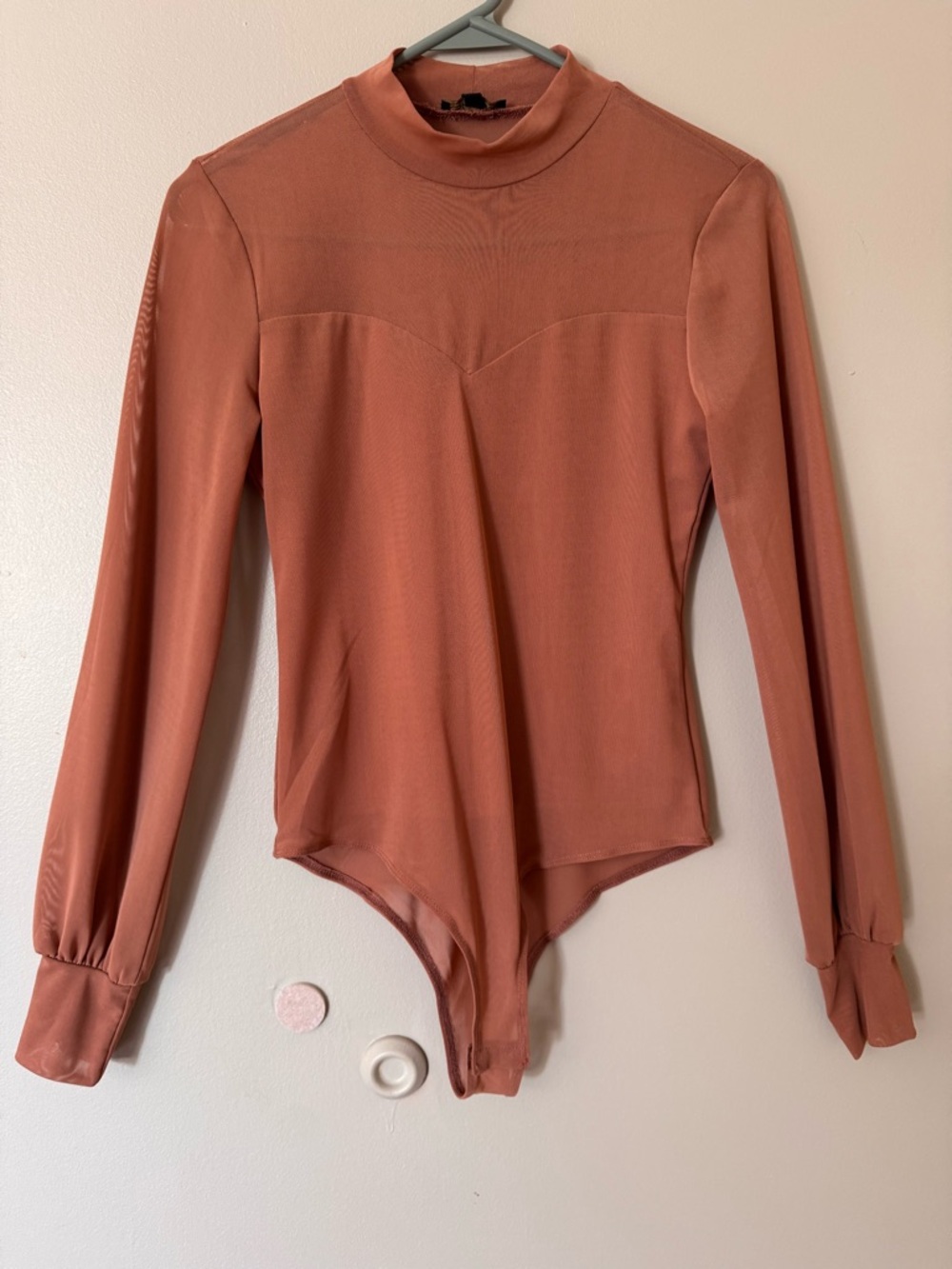 Shinestar Ribbed Mock Neck Bodysuit in Warm Rust